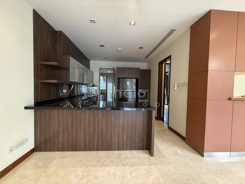 Jalan Remis semi-detached — kitchen with island counter and full-height cabinetry