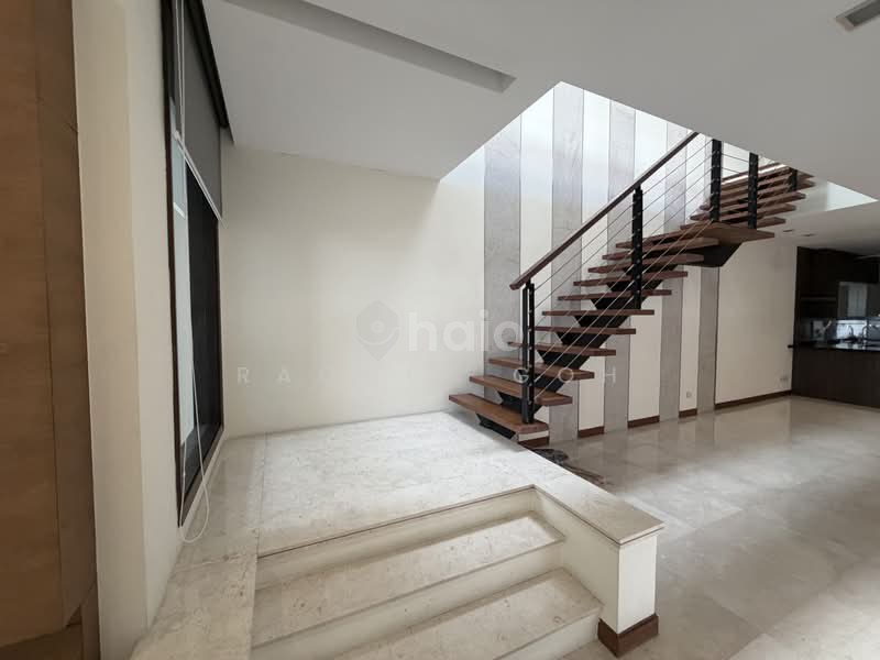 Jalan Remis semi-detached — entrance hall and open timber staircase